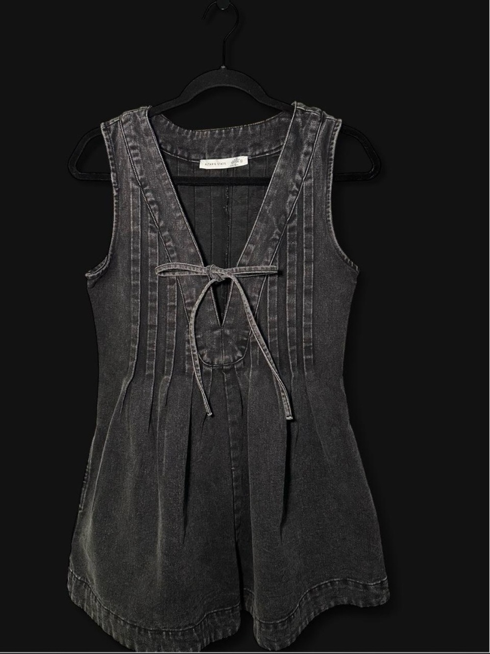 Altar’d State Evie Sleeveless Tie-Front Denim Romper in Washed Black